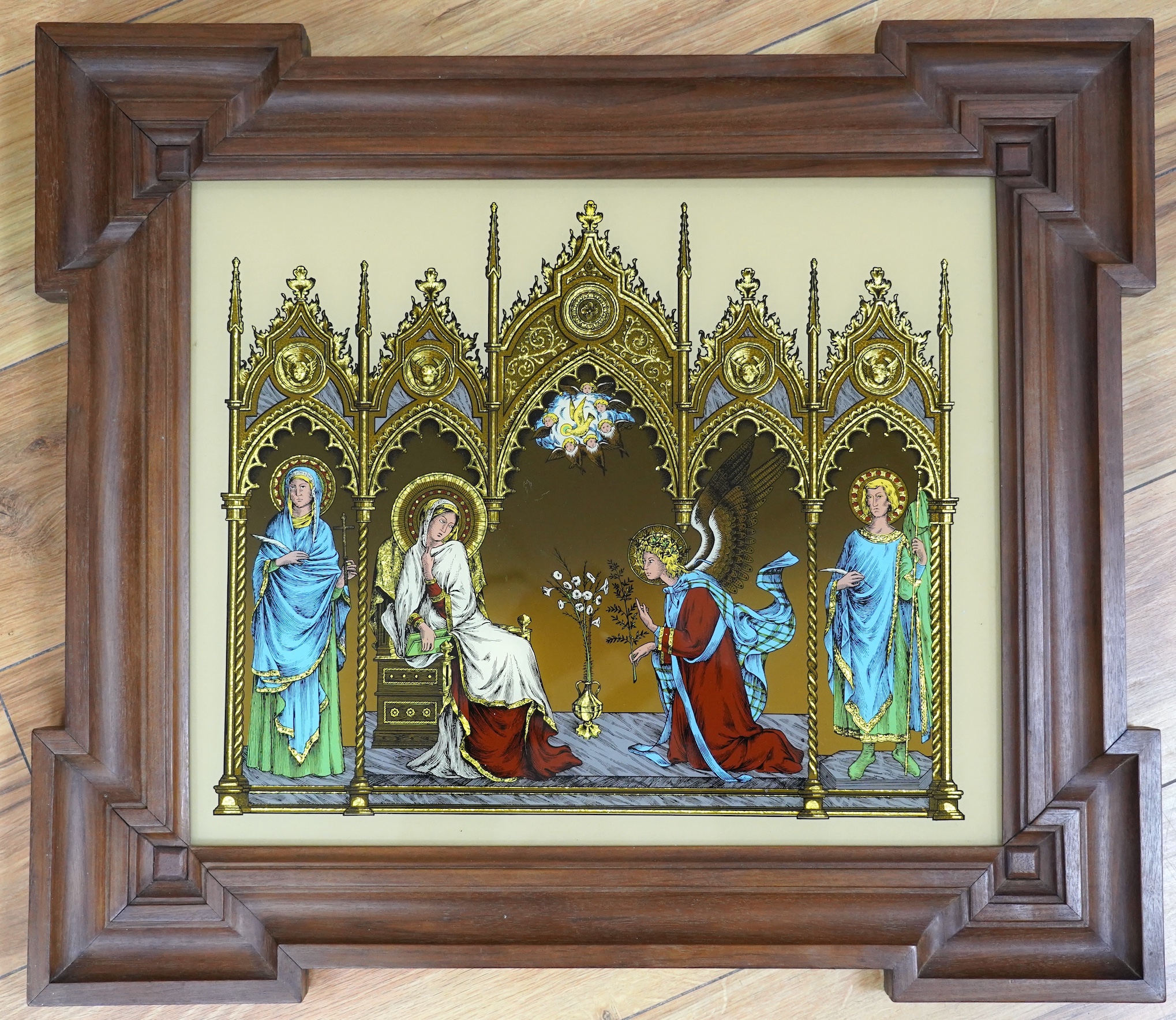 A Russian icon and religious foil framed picture, foil picture 45cm wide, 35.5cm high